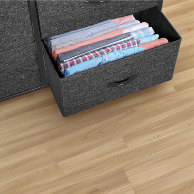 Drawer pulled out from black 16 drawer storage chest