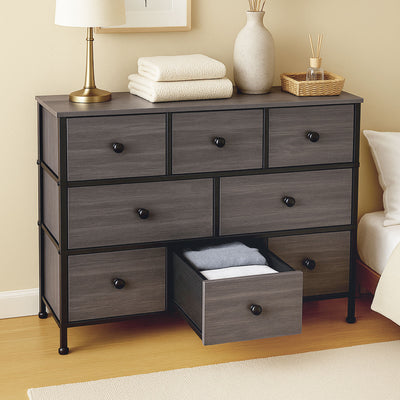 Spacious fabric drawer dresser with wooden surface, perfect for storage in New Zealand homes.