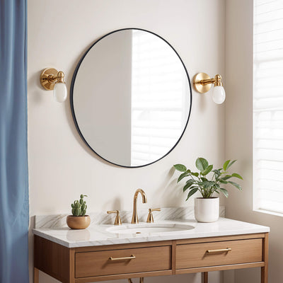 Lifestyle image of stella round mirror black in bathroom setting
