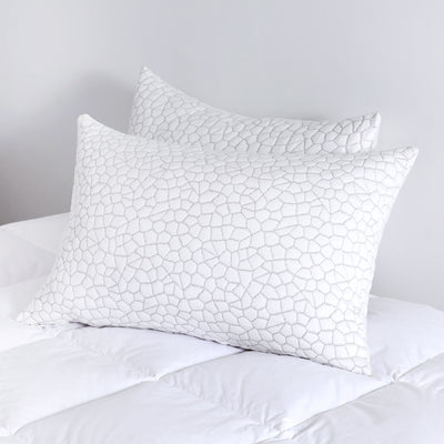 Side view of two adjustable shredded foam pillows showing loft and firmness