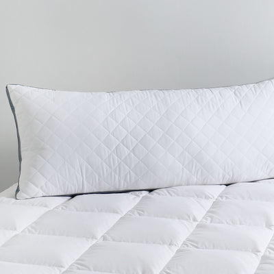 Close-up of body pillow with removable and washable fabric cover

