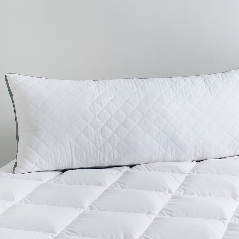 Close-up of body pillow with removable and washable fabric cover

