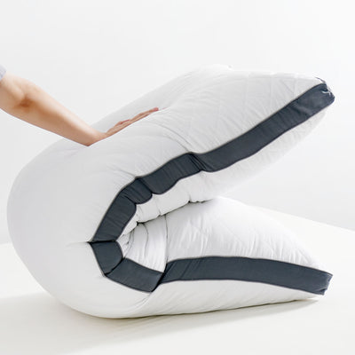 Body pillow providing support for side sleepers and full-body alignment

