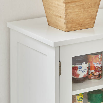 Detailed view of the adjustable shelf inside the Cantey Pantry Storage Cabinet in white, focusing on the shelf's texture and quality.
