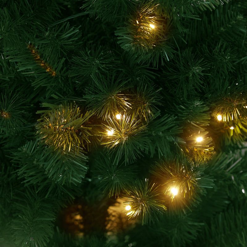 Classic 180cm Christmas tree glowing warmly to create a cozy Christmas mood in NZ