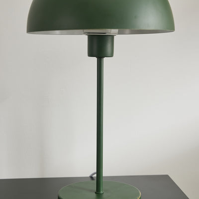 	Compact green metal desk lamp with dome shape – versatile NZ lighting solution
