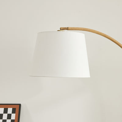Contemporary floor lamp with natural metal arc design – adds modern flair
