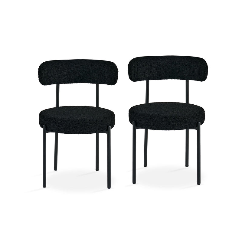 Close-up showing craftsmanship and finish of black dining chairs
