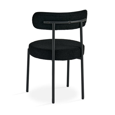 Stackable design of black dining chairs for easy storage