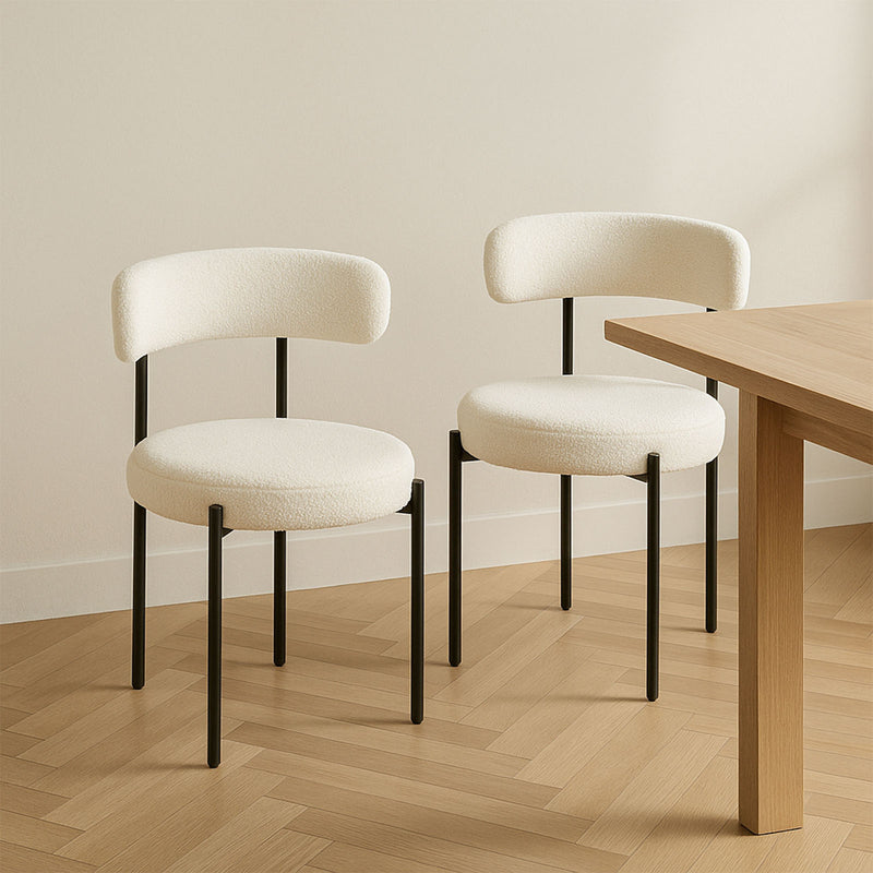 Neutral white dining chairs sold in a set of 2
