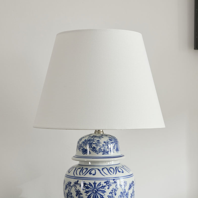 Elegant blue ginger jar table lamp with a refined shade – a lighting statement piece