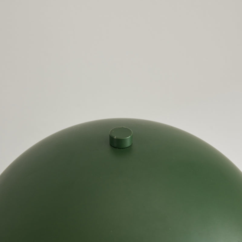 Industrial-style green metal table lamp with dome shade for urban NZ interiors