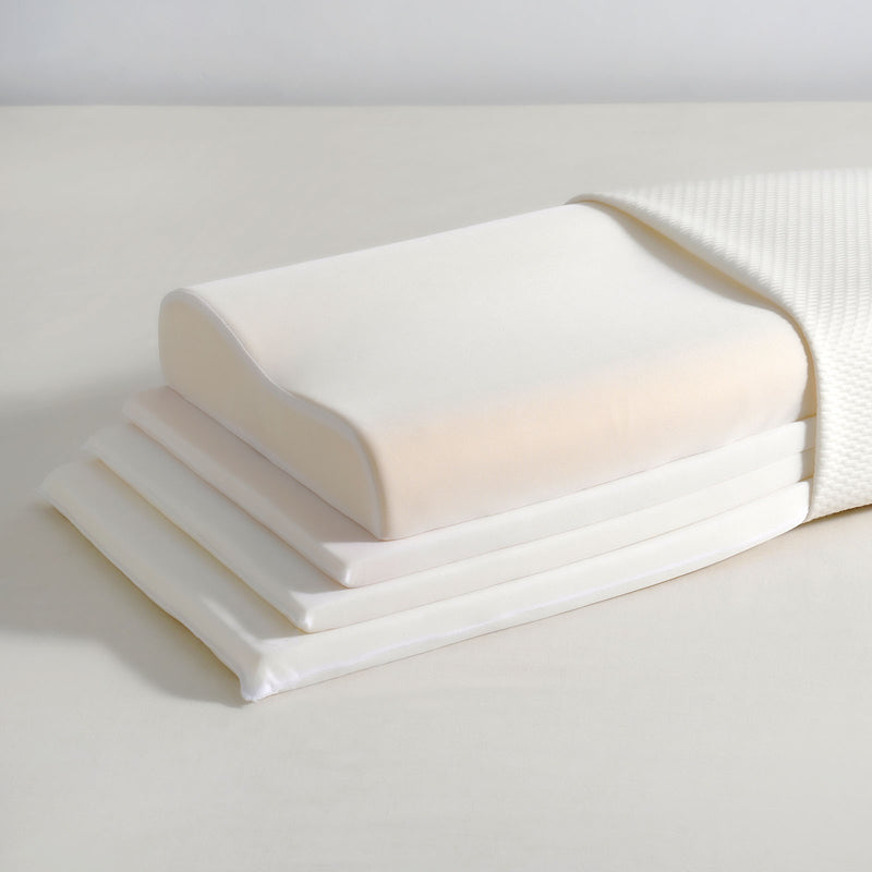 Adjustable memory foam pillow styled on a bed in a modern New Zealand bedroom
