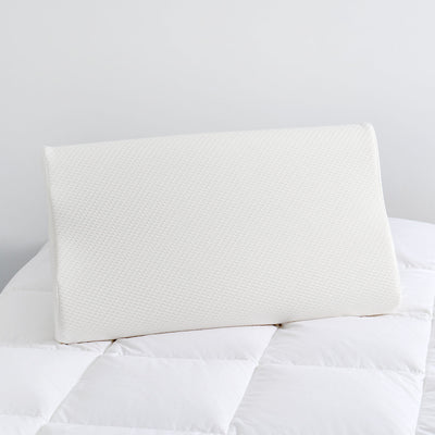 Close-up of neck support pillow with soft, removable, and washable cover

