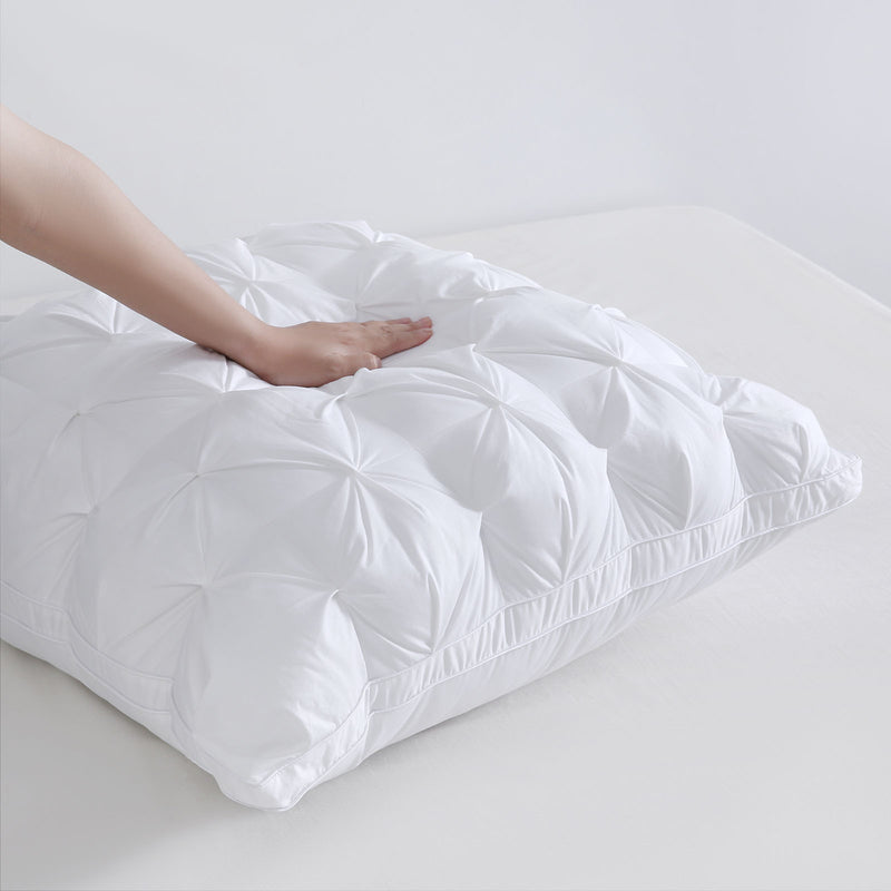 Close-up of luxurious pinch pleat texture on European-style pillow cover

