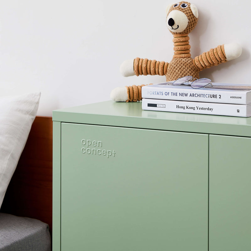 Interior view of Rainbow Sideboard Storage Locker in green with doors open, revealing shelves and storage options.