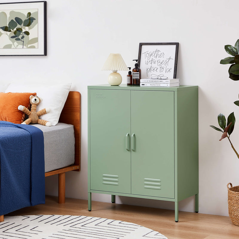 Close-up of the elegant handles on the green Rainbow Sideboard Storage Locker.