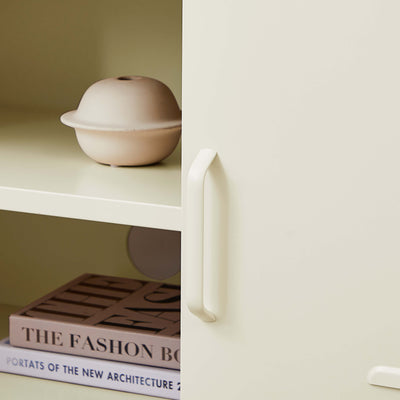 Top view of the cream Rainbow Steel Storage Locker, displaying its compact top and durable material.