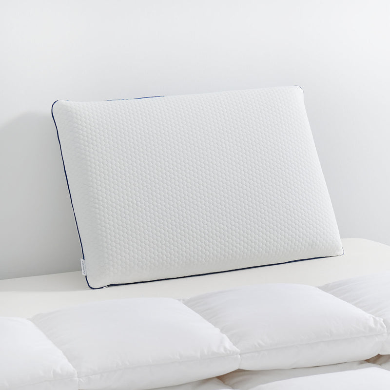 Side view of breathable memory foam pillow showing height and contour support

