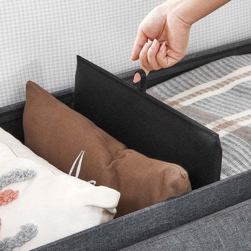 The interior of the grey Storage Ottoman Bench shown empty, emphasizing the clean lines and spacious storage compartment.