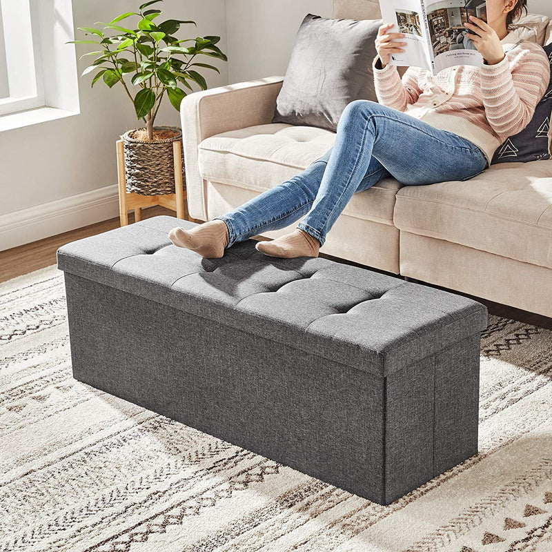 Side view of the large grey Storage Ottoman Bench, illustrating its depth and plush top cushion.