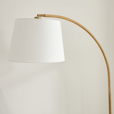 Tall arc floor lamp in natural-toned metal – a statement piece in NZ homes
