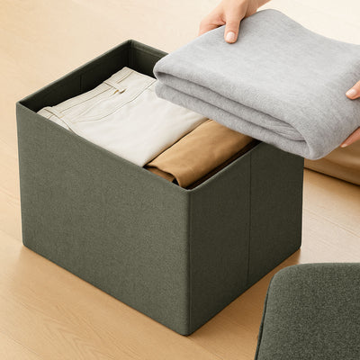Compact foldable ottoman in olive green for home or office use