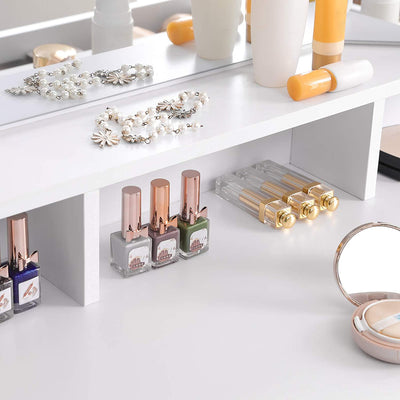 Close-up of the tri-fold mirror on the Vasagle Dressing Table, highlighting its expansive viewing angles and detailed frame design.